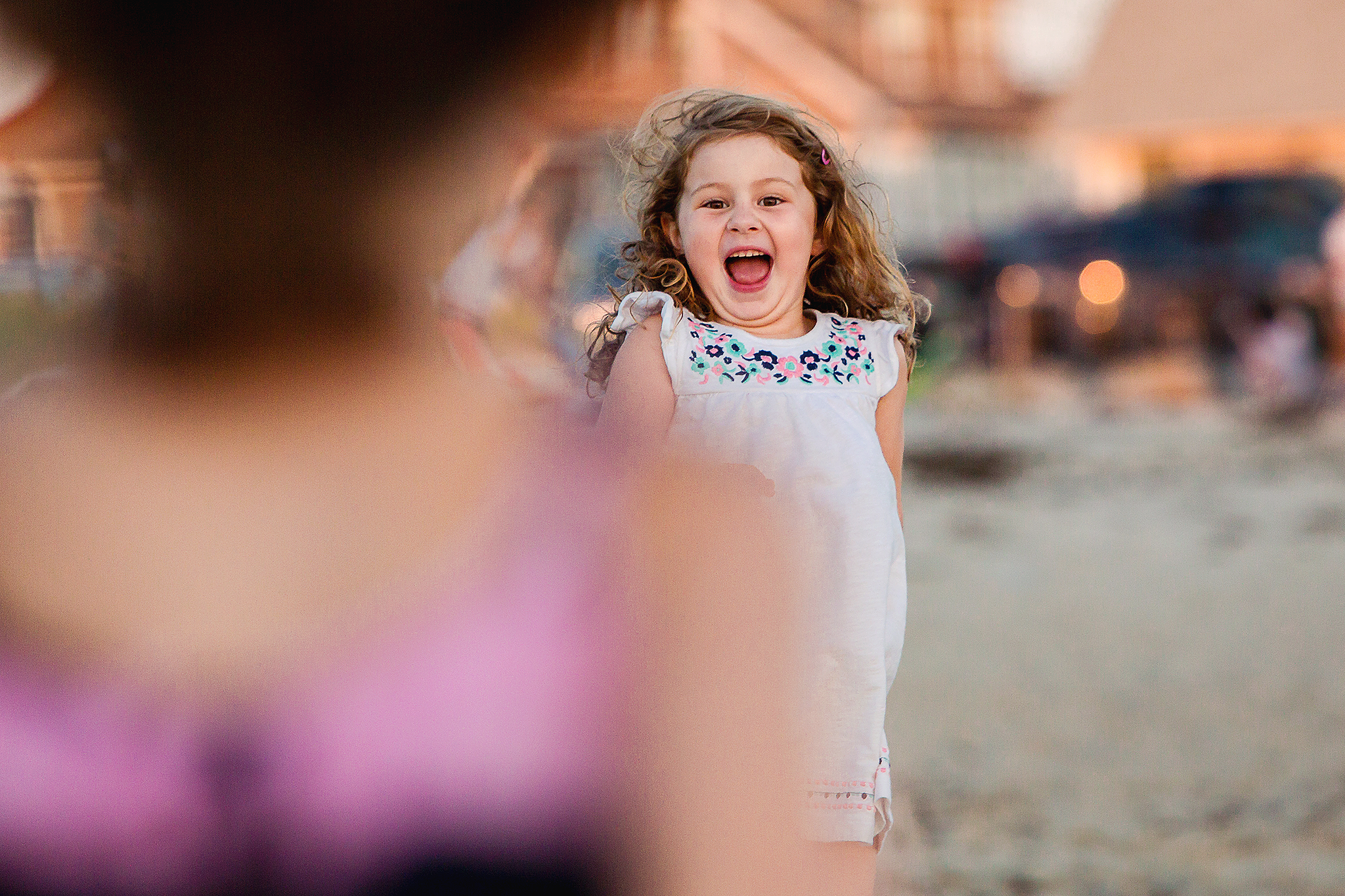 little girl running on beach